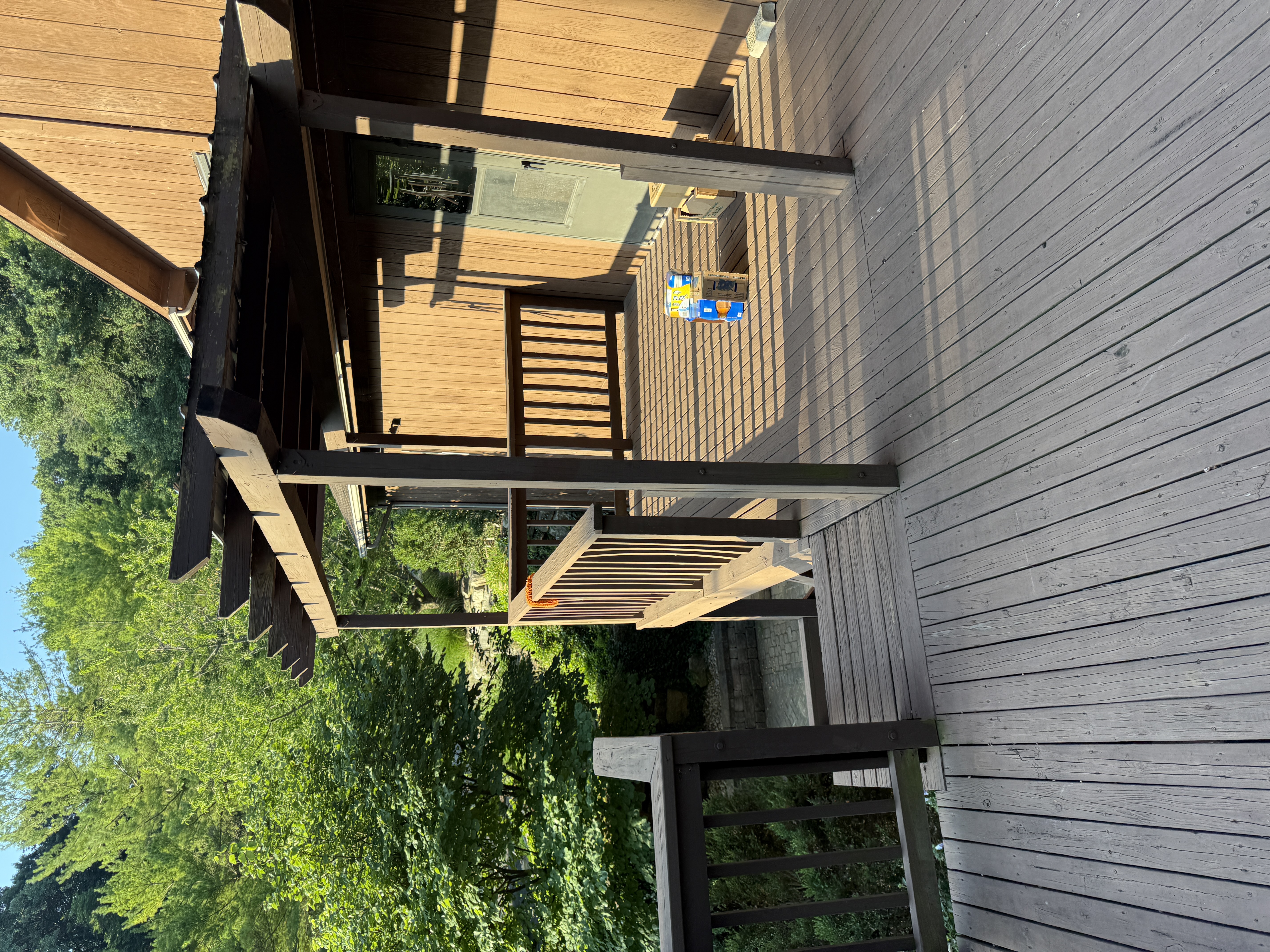 Deck corner with planters and black rail